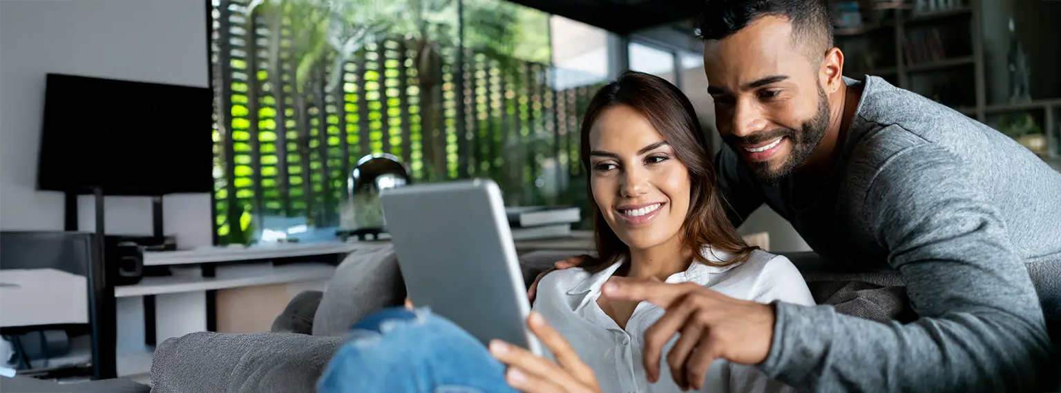 Couple looking at tablet